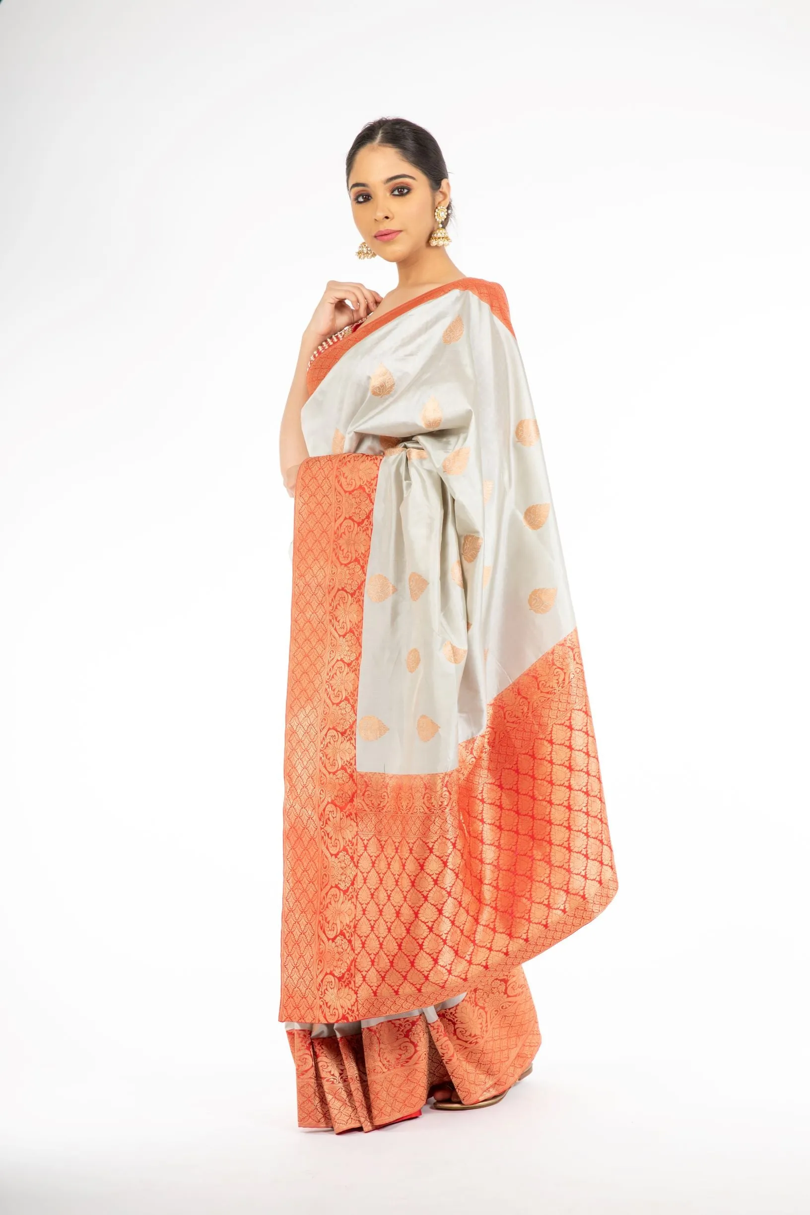 Adorning Grey Handloom Banarasi Silk Saree with Red Color Pallu