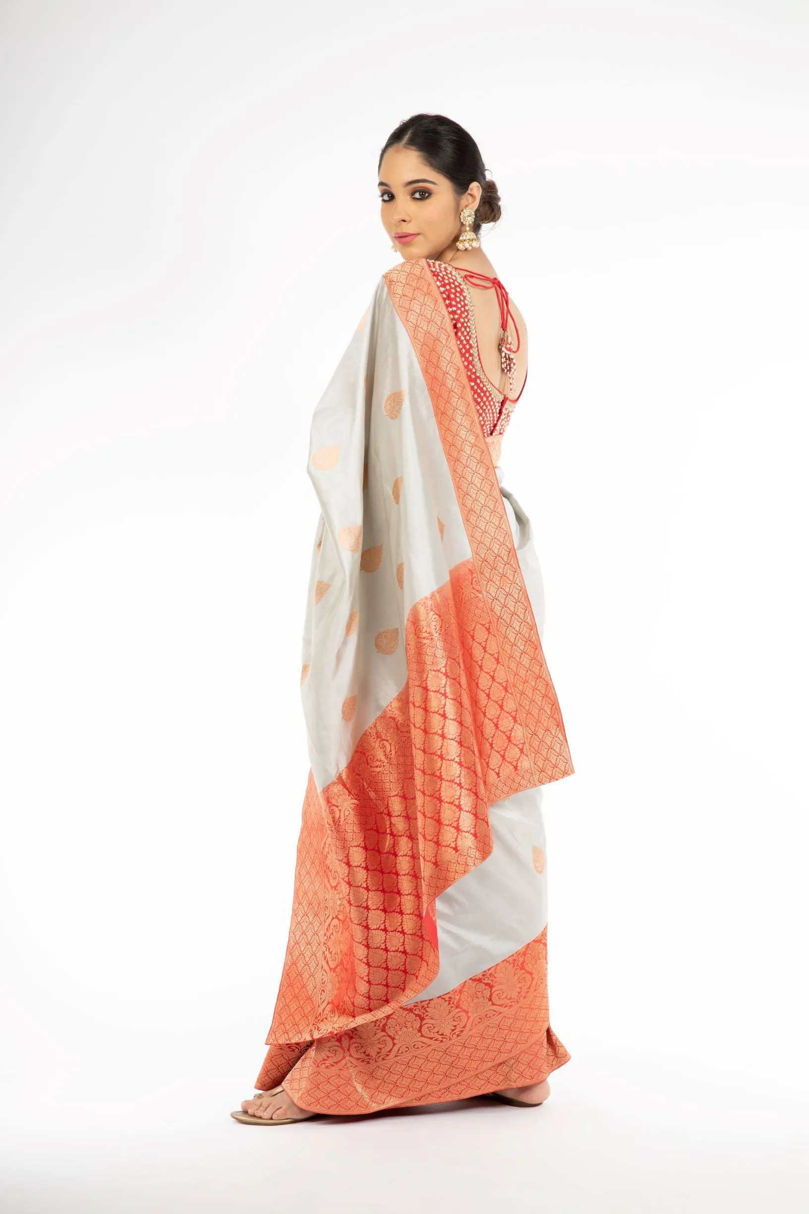 Adorning Grey Handloom Banarasi Silk Saree with Red Color Pallu