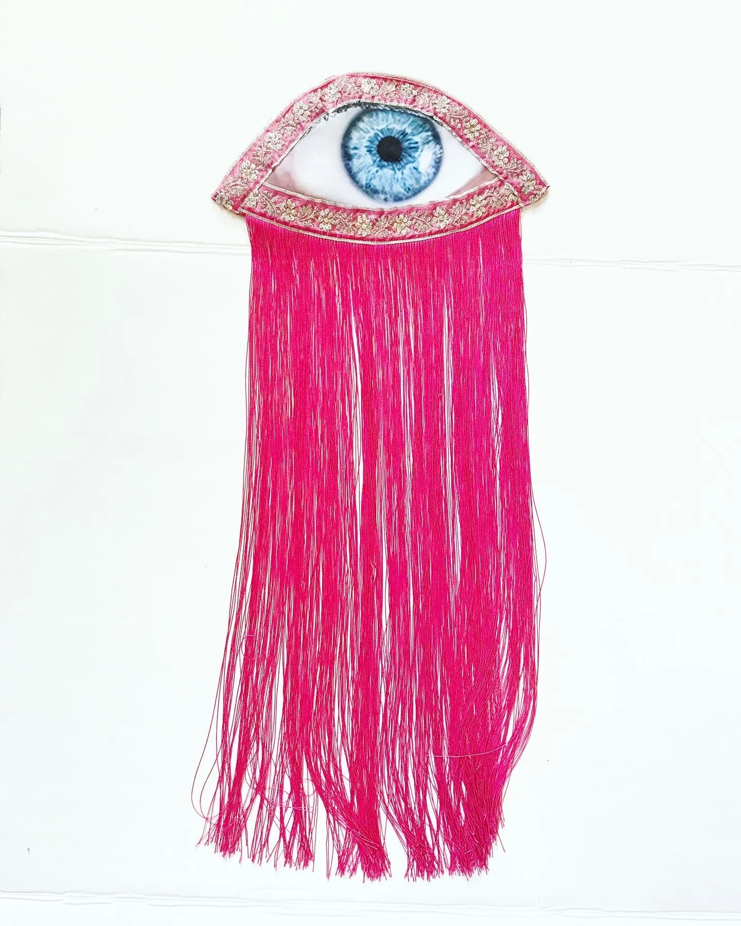 Eye Appliqué with fuchsia fringe