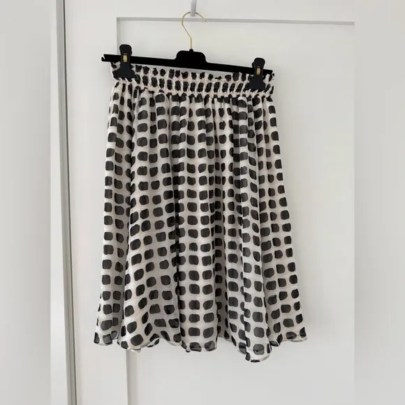 Kate Spade pink black and white knee length silk skirt.