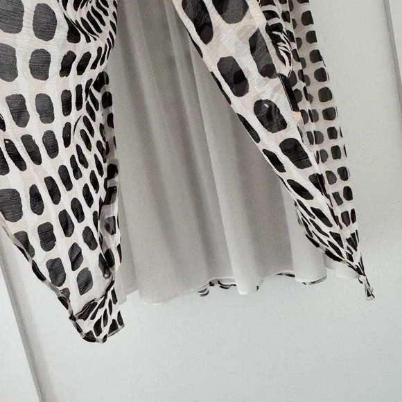 Kate Spade pink black and white knee length silk skirt.