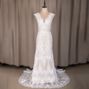 Wedding Dress Features Deep V-Neck Sexy Backless With Cap Sleeves Made In Lace Sheath Boho Style